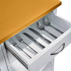 Carrello da cucina con ripiano in noce, cassetti e ruote per una conservazione flessibile